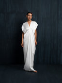 Elegant ivory white silk kaftan with deep V-neck and cap sleeves, handcrafted from 100% mulberry silk, eco-friendly botanical dye, ideal for weddings, luxury events, and resort wear