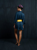 Back view of mulberry silk kimono indigo and yellow silk belt. Luxury fashion for bridal, daily, and resort wear.
